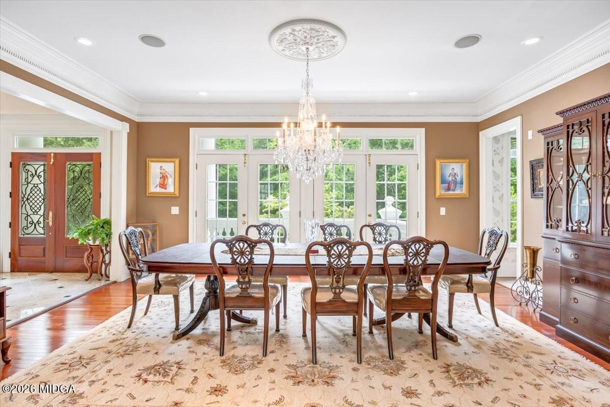 311 North Rivoli Farms Drive Macon, GA 31210 - Photo 3 of 79 a view of a dining room with furniture window and wooden floor