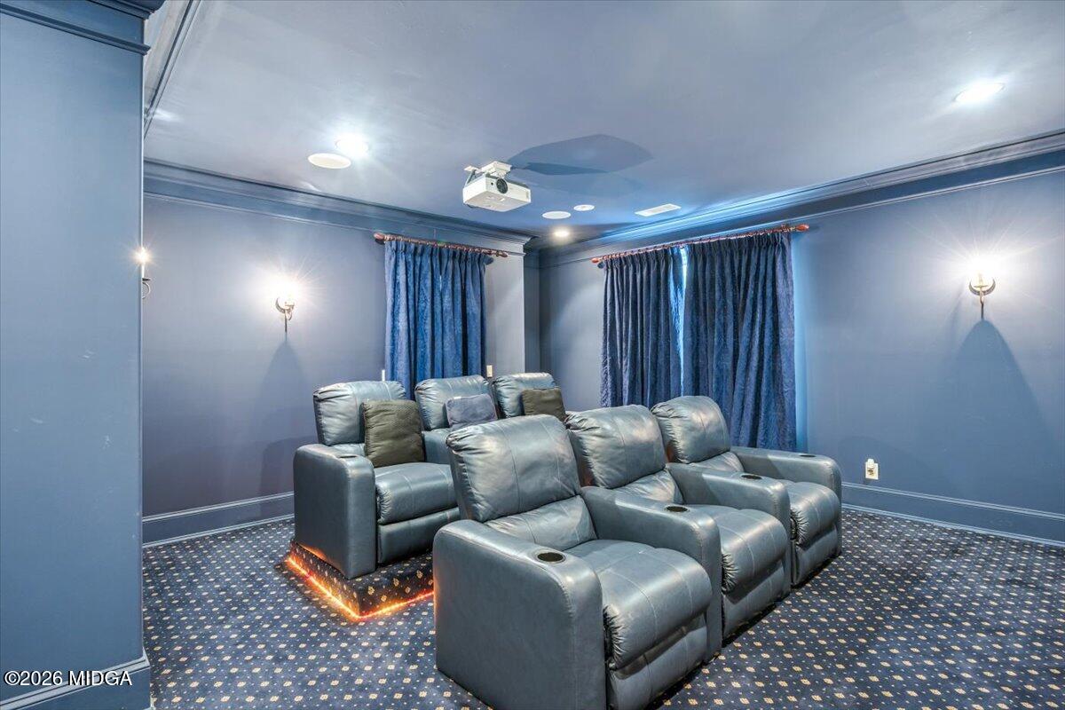 311 North Rivoli Farms Drive Macon, GA 31210 - Photo 33 of 79 a media room with furniture a rug and a window