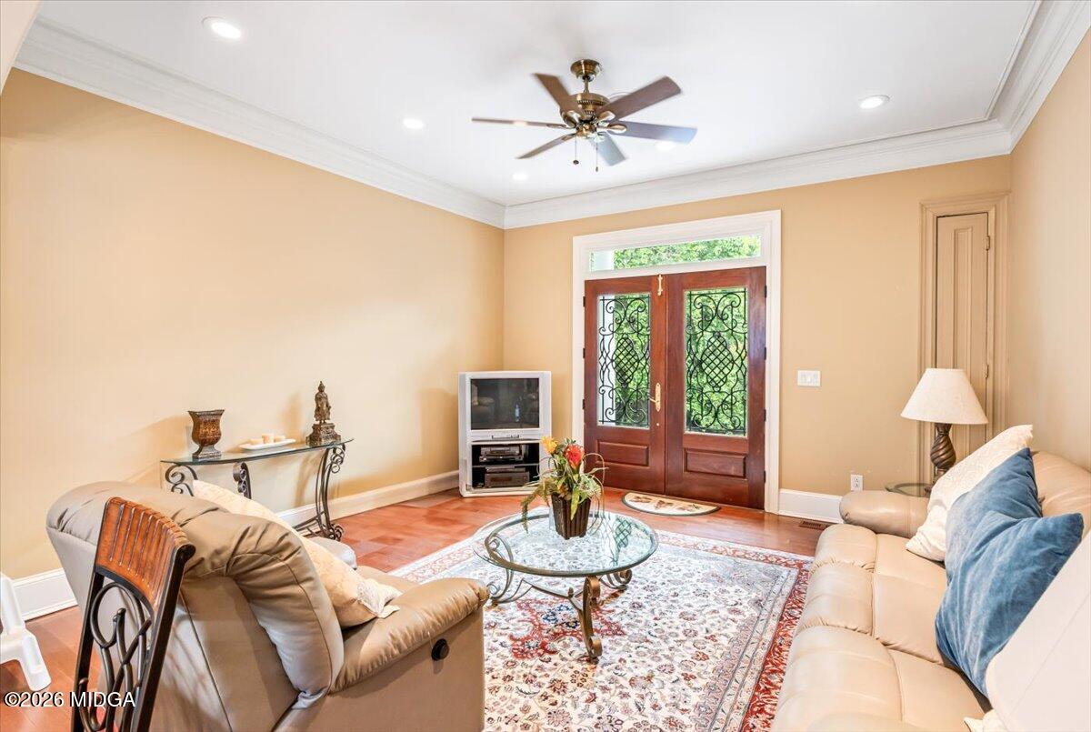 311 North Rivoli Farms Drive Macon, GA 31210 - Photo 55 of 79 a living room with furniture and a large window