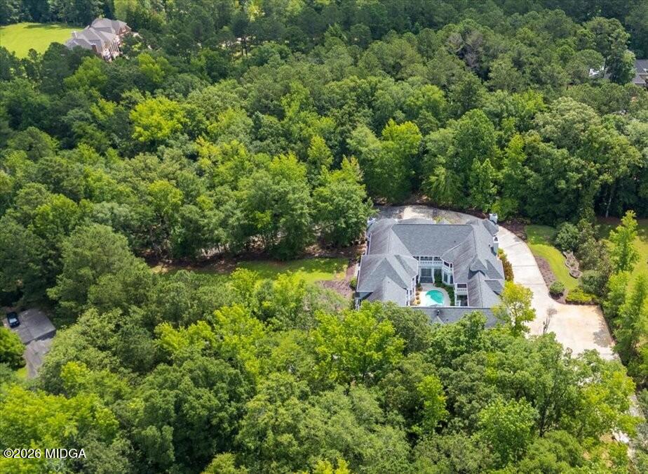 311 North Rivoli Farms Drive Macon, GA 31210 - Photo 68 of 79 an aerial view of a house with a yard and lake view