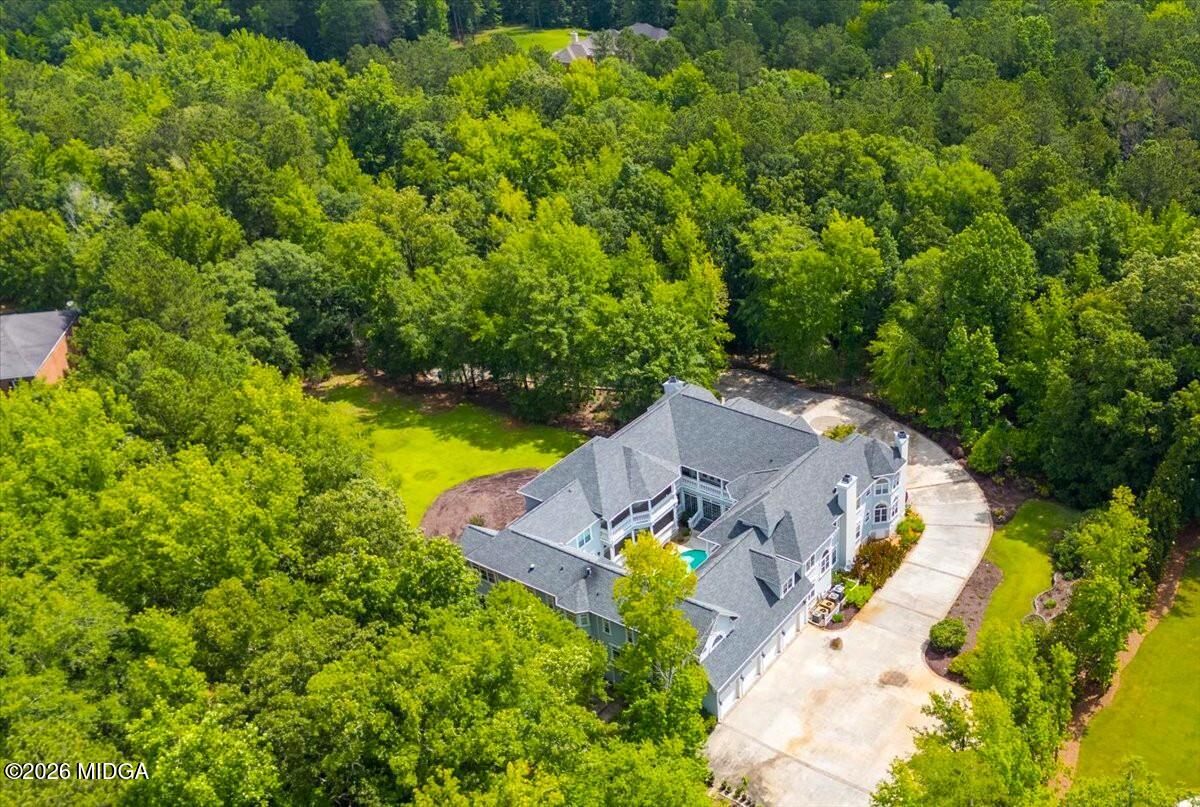 311 North Rivoli Farms Drive Macon, GA 31210 - Photo 70 of 79 an aerial view of a house with swimming pool and garden