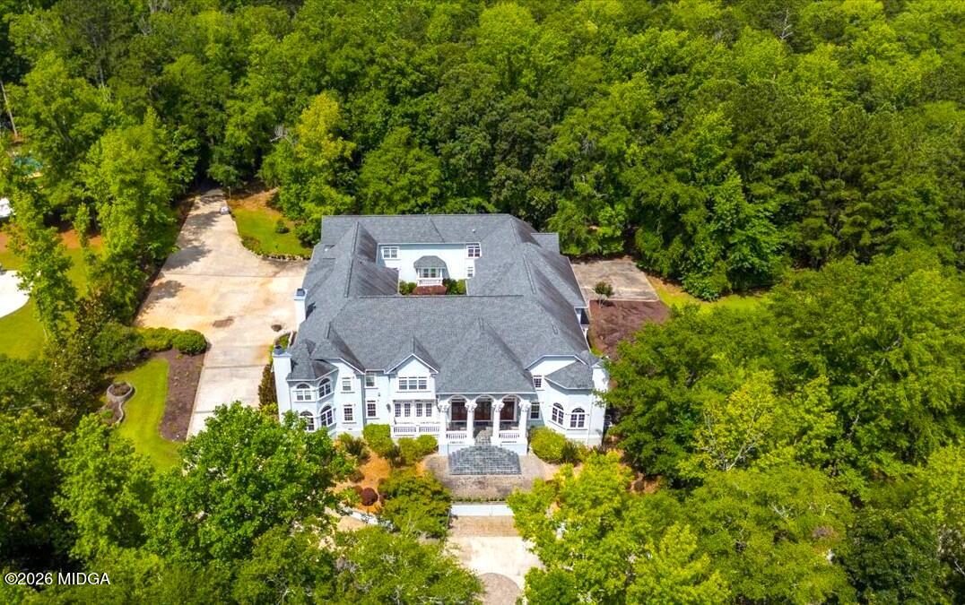 311 North Rivoli Farms Drive Macon, GA 31210 - Photo 72 of 79 an aerial view of a house with a yard swimming pool a patio and yard