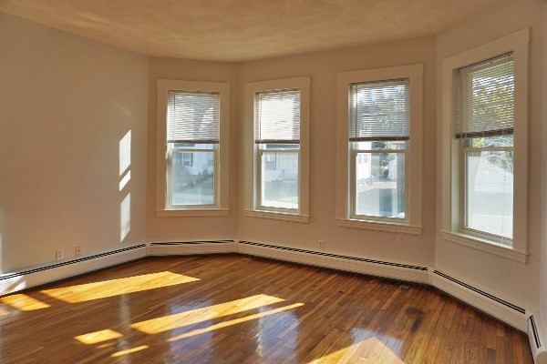 252 Ash Street, Unit 2 Waltham, MA 02453 - Photo 7 of 9 a view of a room with windows