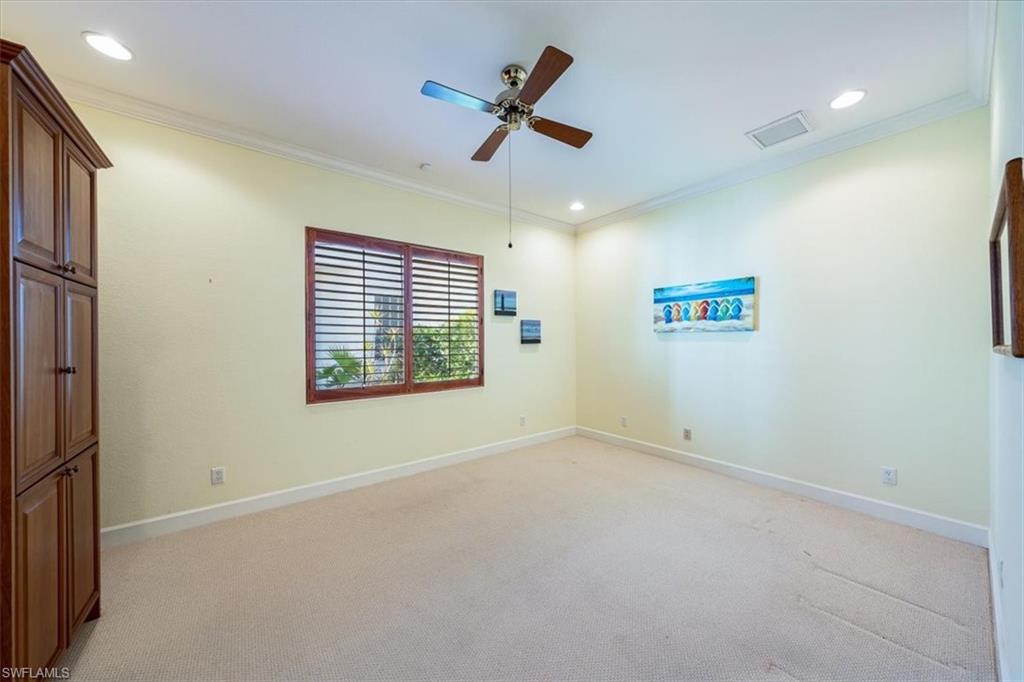 352 Steerforth Court Naples, FL 34110 - Photo 18 of 35 a view of an empty room with a window