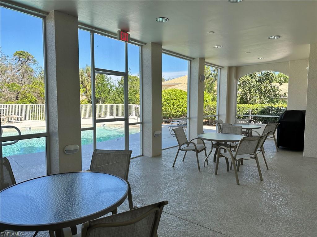 352 Steerforth Court Naples, FL 34110 - Photo 29 of 35 a view of a dining room with furniture window and outside view
