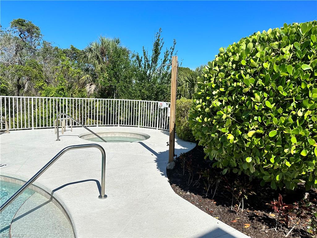352 Steerforth Court Naples, FL 34110 - Photo 30 of 35 a view of a balcony with a plant