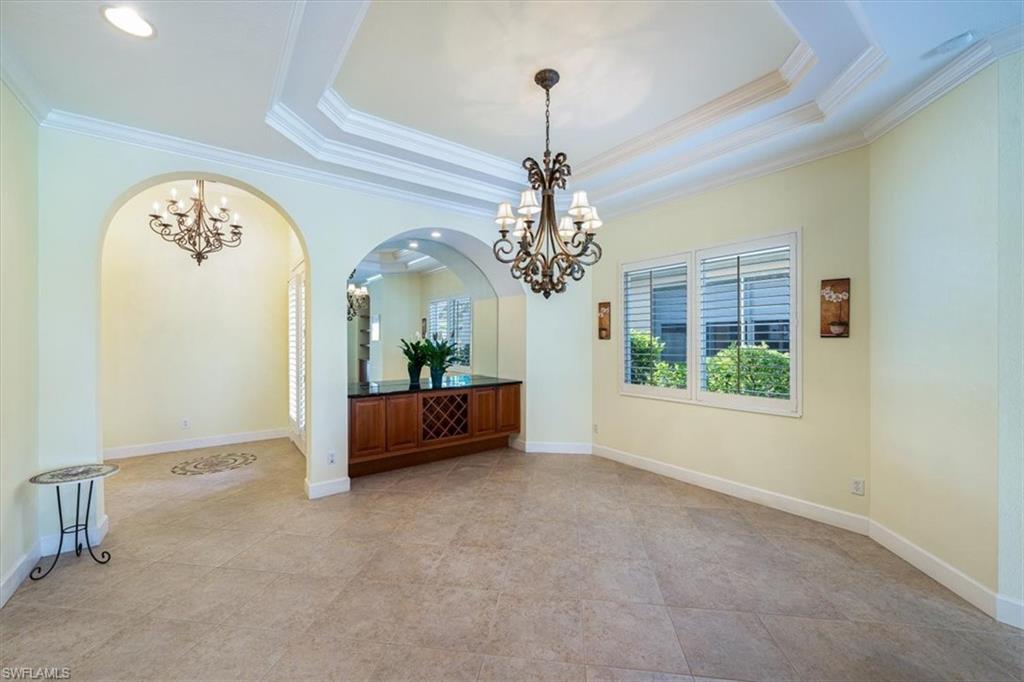 352 Steerforth Court Naples, FL 34110 - Photo 3 of 35 a view of a chandelier and a chandelier in a room