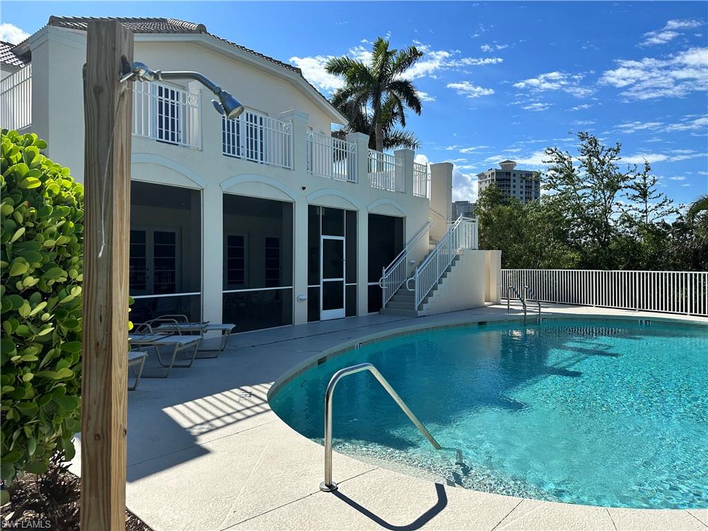 352 Steerforth Court Naples, FL 34110 - Photo 31 of 35 a view of a house with backyard and sitting area