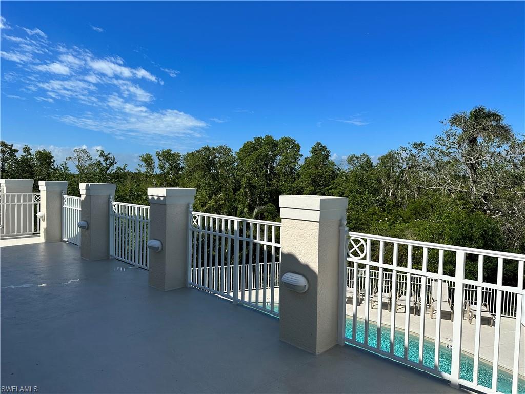 352 Steerforth Court Naples, FL 34110 - Photo 33 of 35 a view of a city from a balcony