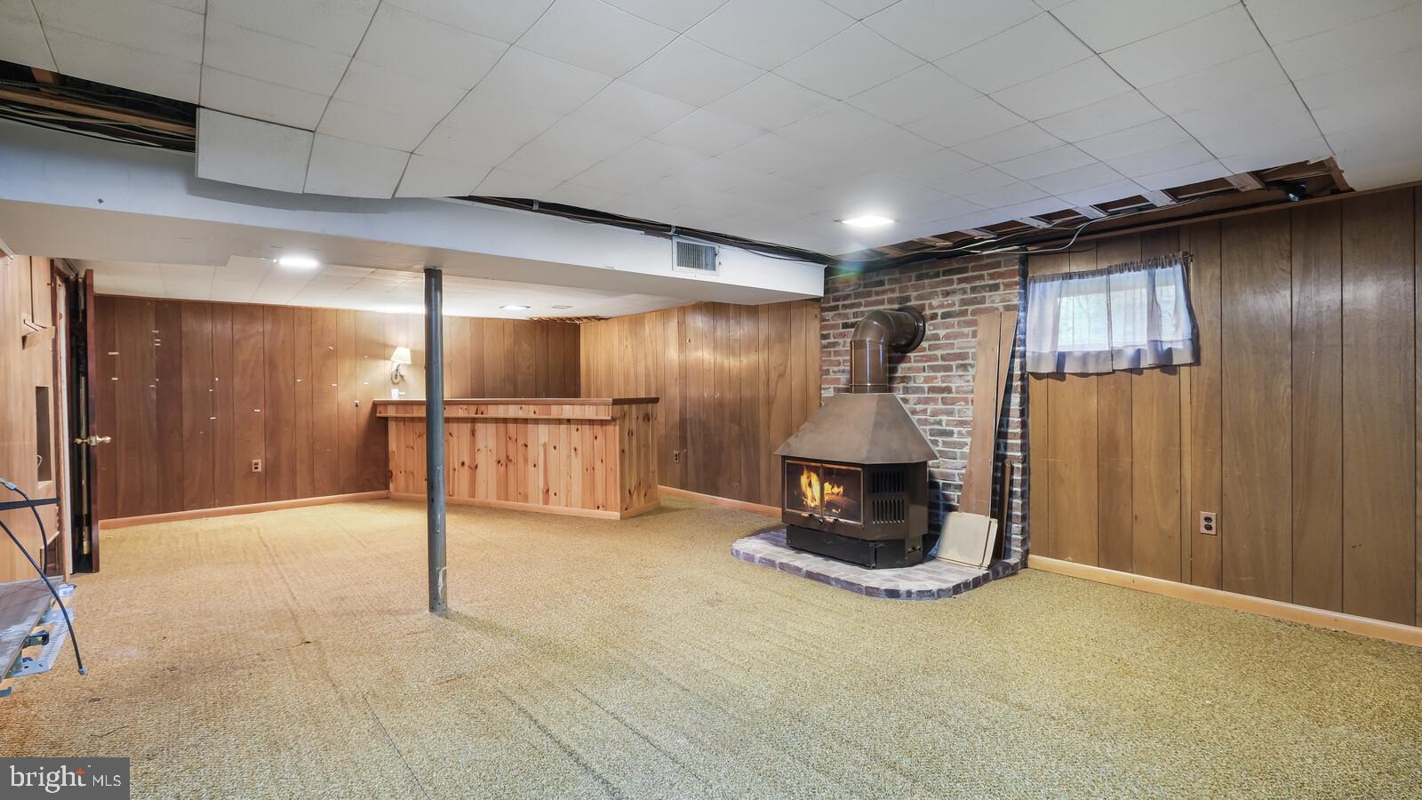 2590 Weir Road Aston, PA 19014 - Photo 14 of 19 Full Partially Finished Basement w/ Wood Stove