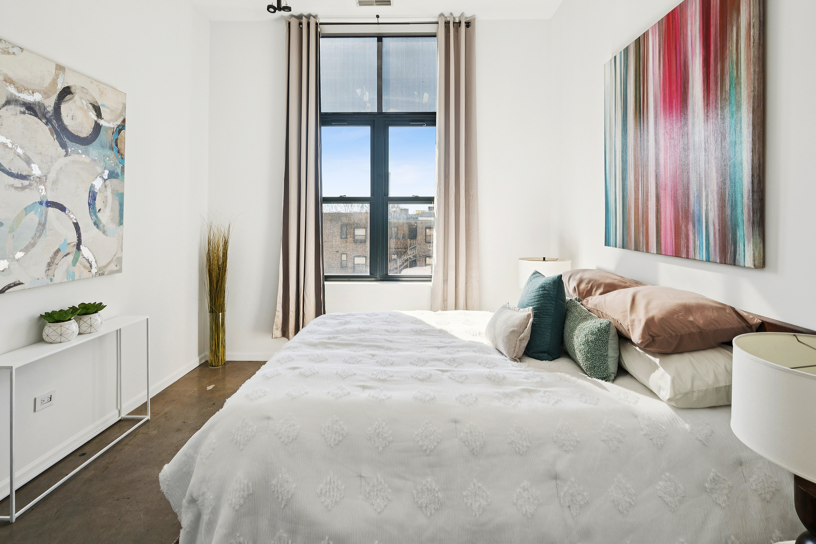 3631 North Halsted Street, Unit 308 Chicago, IL 60613 - Photo 15 of 20 a bedroom with a bed and a window