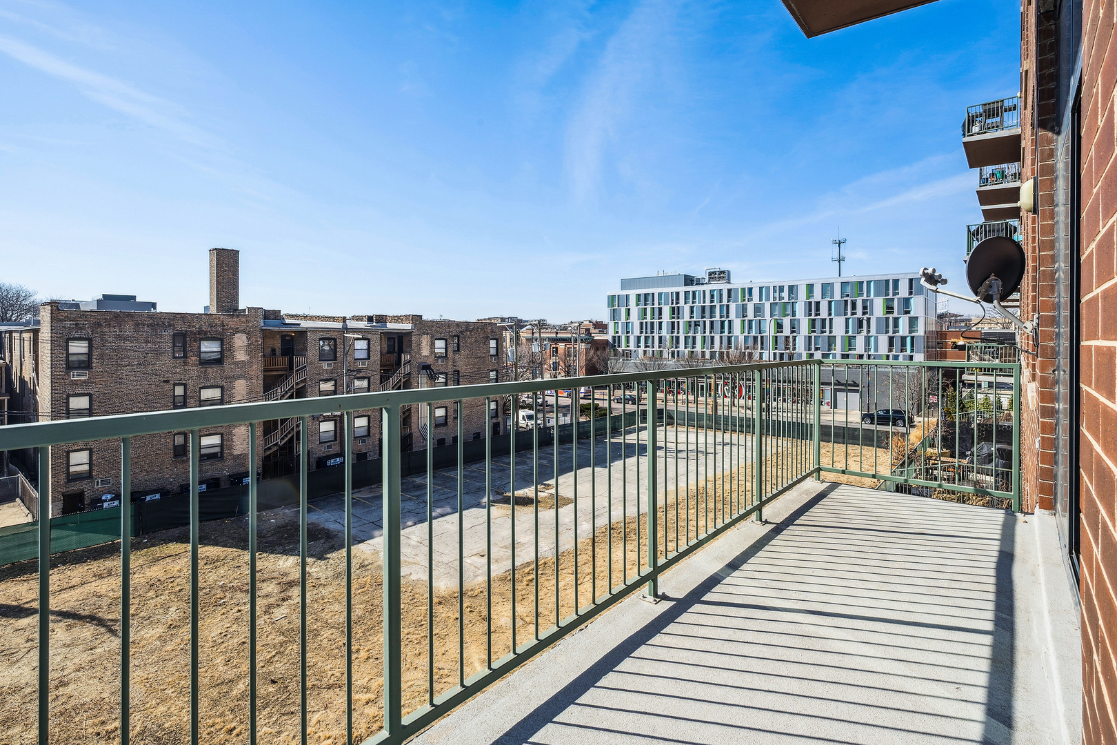 3631 North Halsted Street, Unit 308 Chicago, IL 60613 - Photo 20 of 20 a view of city from a balcony