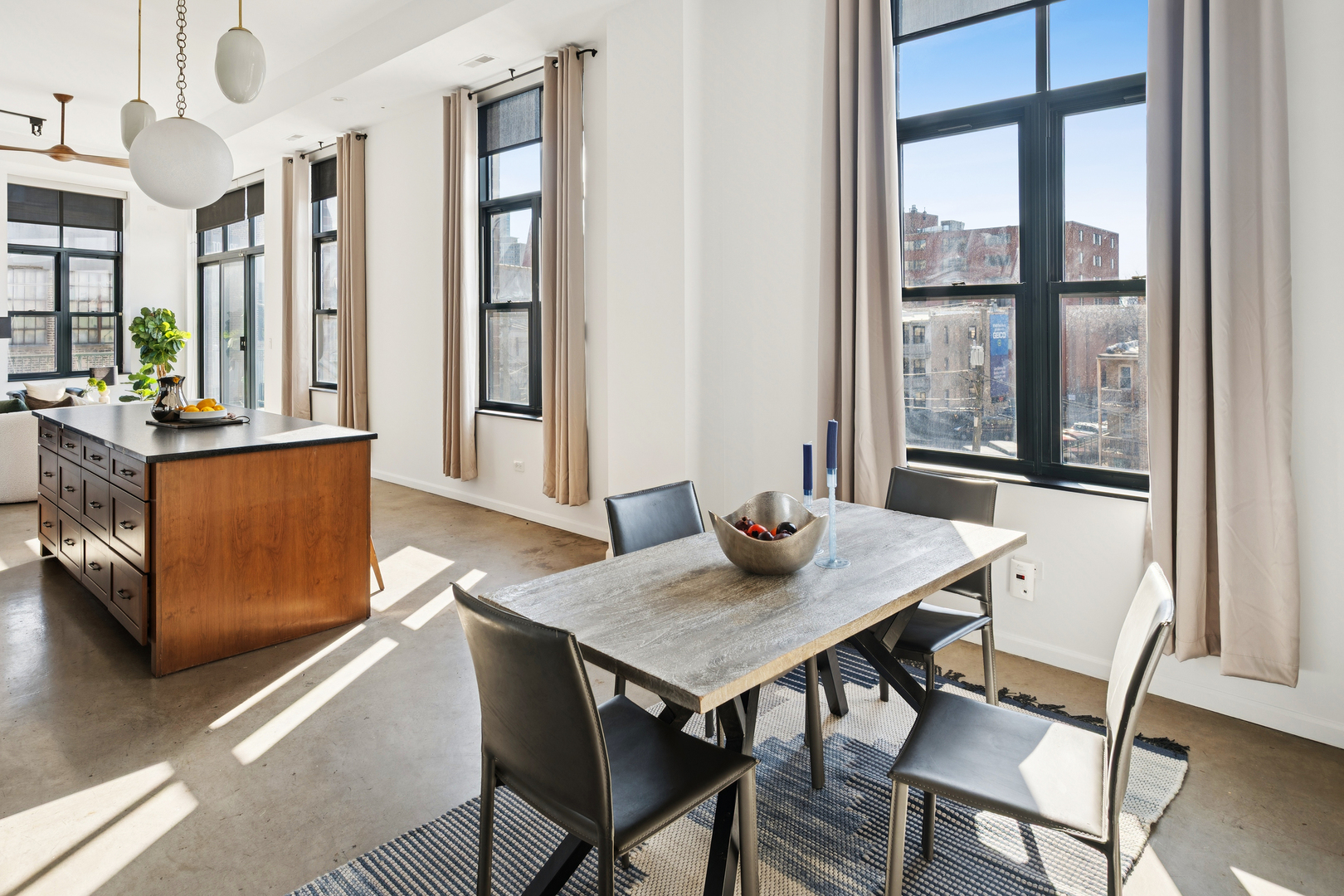 3631 North Halsted Street, Unit 308 Chicago, IL 60613 - Photo 10 of 20 a view of a dining room with furniture and window