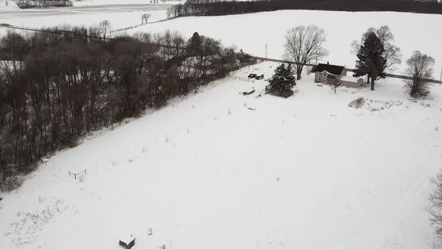 a view of roof covered with snow