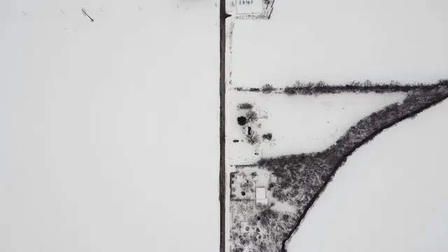 a view of ocean with a mountain
