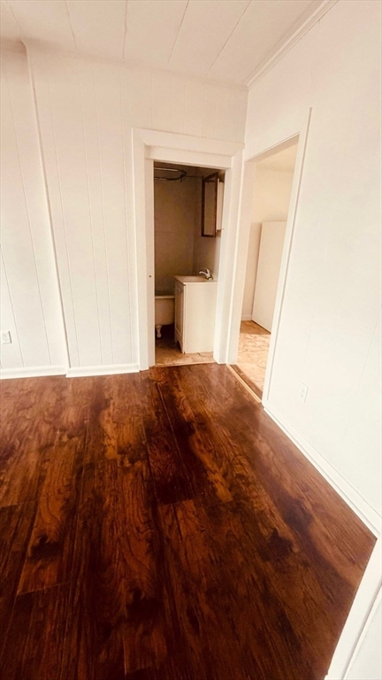 245 County Street, Unit 10 Fall River, MA 02723 - Photo 2 of 9 a view of empty room with wooden floor