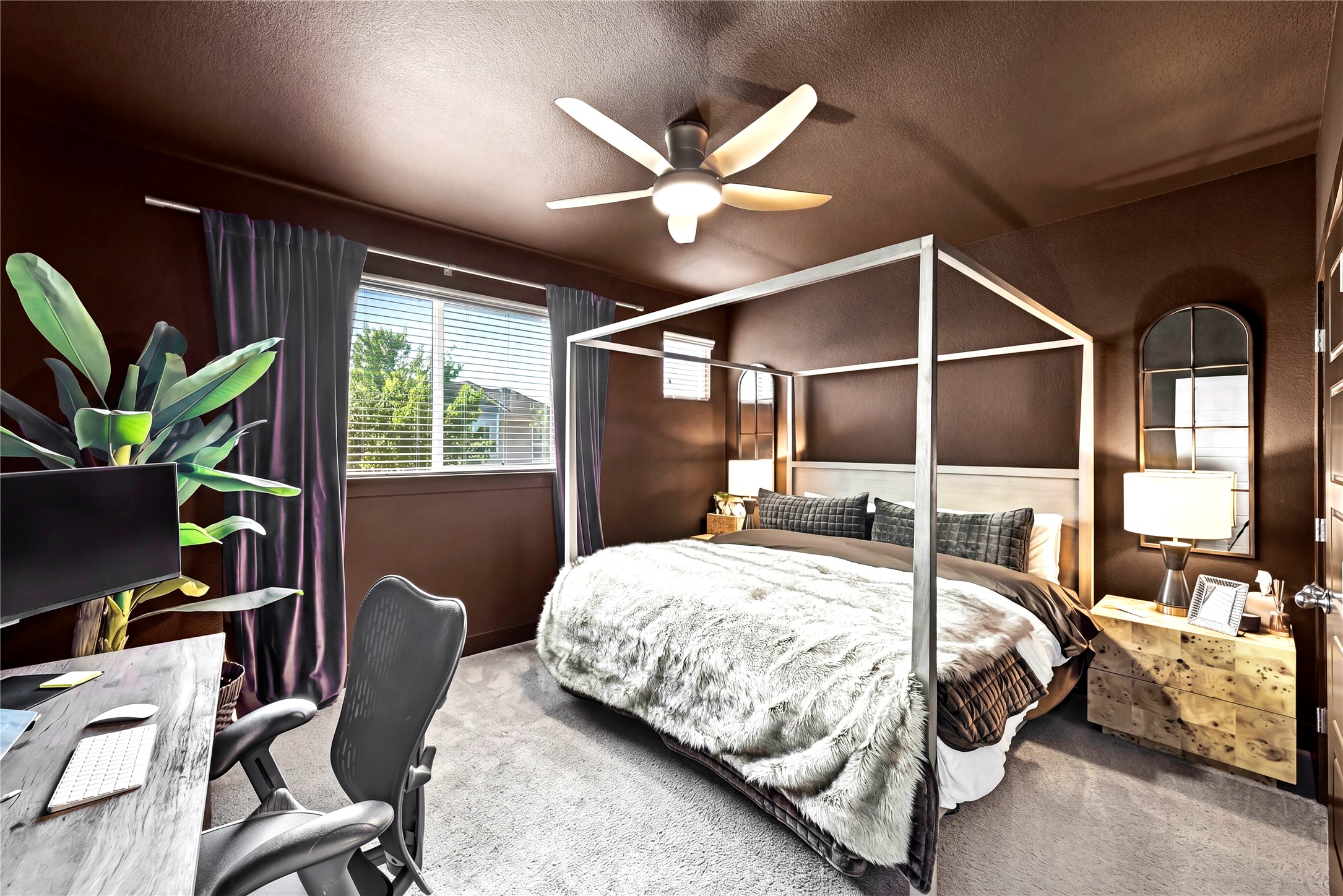 2306 Capulet Street Austin, TX 78741 - Photo 12 of 21 a bedroom with a bed and a desk