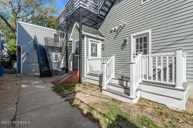 a front view of a house with a garage