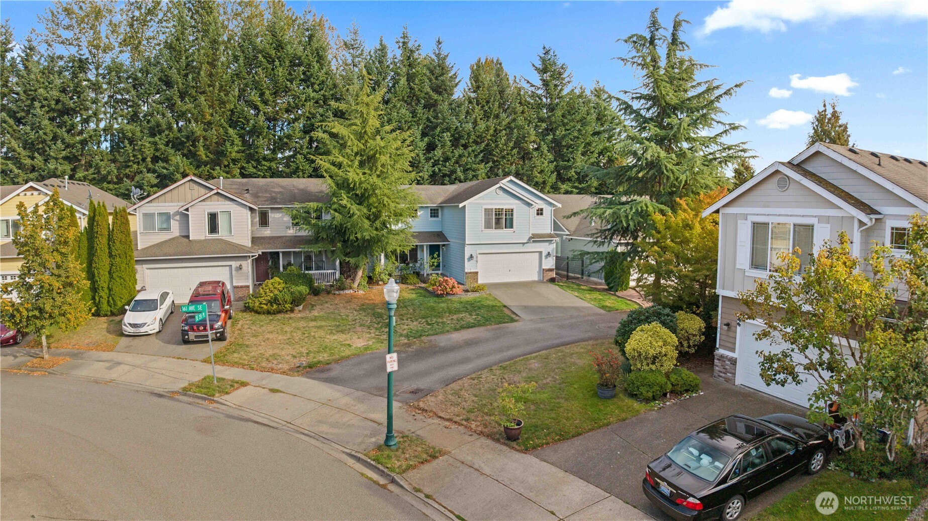 16107 Southeast 255th Place Covington, WA 98042 - Photo 30 of 30 a front view of a house with a garden