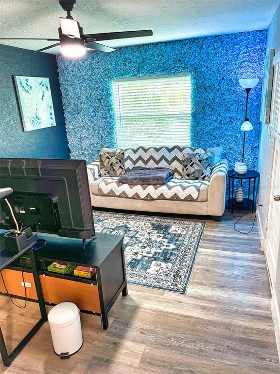 40 East Princeton Street Orlando, FL 32804 - Photo 2 of 14 a room with table tennis and a rug