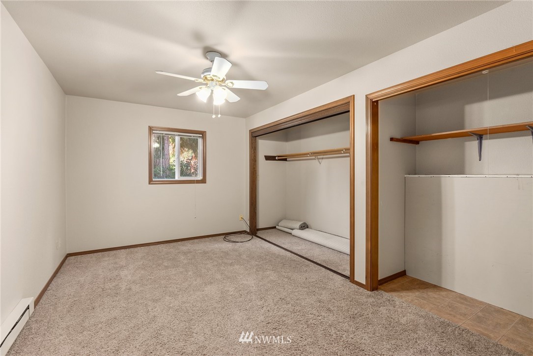 18741 Nutmeg Street Southwest Rochester, WA 98579 - Photo 34 of 39 an empty room with fan and windows