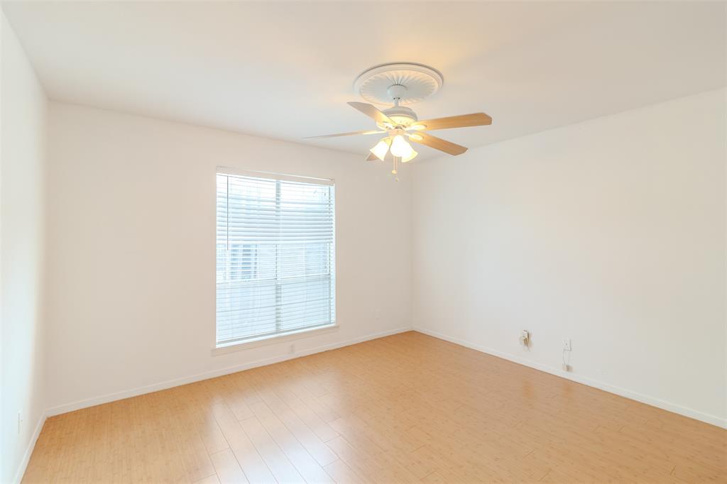 4859 Cedar Springs Road, Unit 234 Dallas, TX 75219 - Photo 13 of 30 an empty room with a window