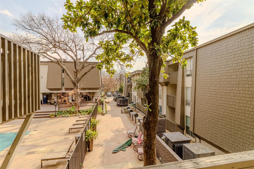4859 Cedar Springs Road, Unit 234 Dallas, TX 75219 - Photo 26 of 30 a view of a patio with chairs and potted plants