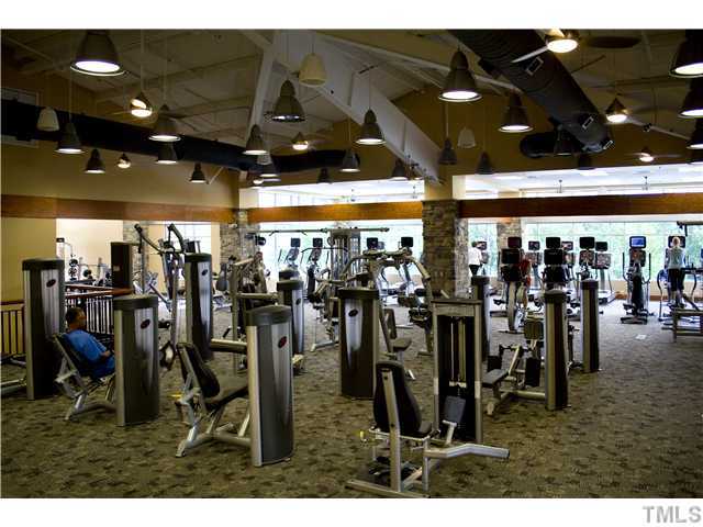 220 Leighann Ridge Lane Rolesville, NC 27571 - Photo 18 of 23 a view of a room with lots of gym equipment