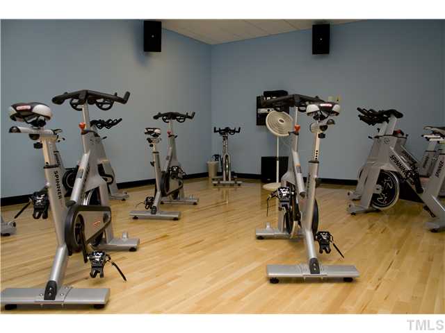 220 Leighann Ridge Lane Rolesville, NC 27571 - Photo 19 of 23 a view of a room with gym equipment
