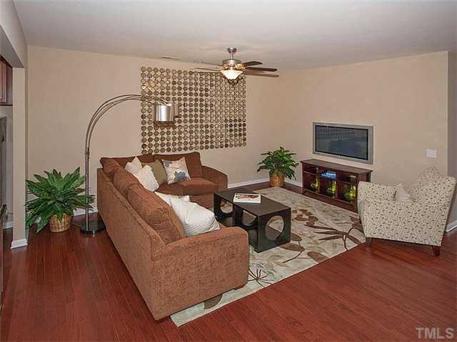 220 Leighann Ridge Lane Rolesville, NC 27571 - Photo 4 of 23 a living room with furniture and wooden floor