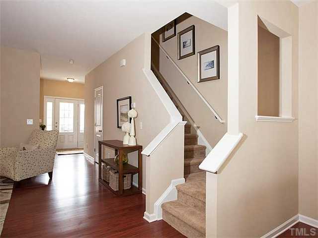 220 Leighann Ridge Lane Rolesville, NC 27571 - Photo 7 of 23 a view of entryway and hall with wooden floor