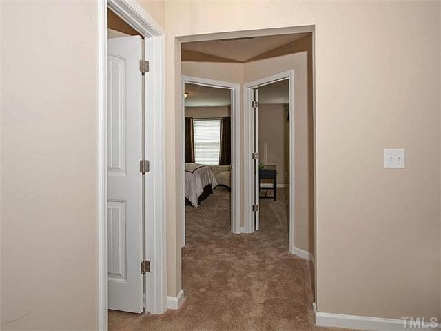 220 Leighann Ridge Lane Rolesville, NC 27571 - Photo 8 of 23 a view of a bathroom from a hallway