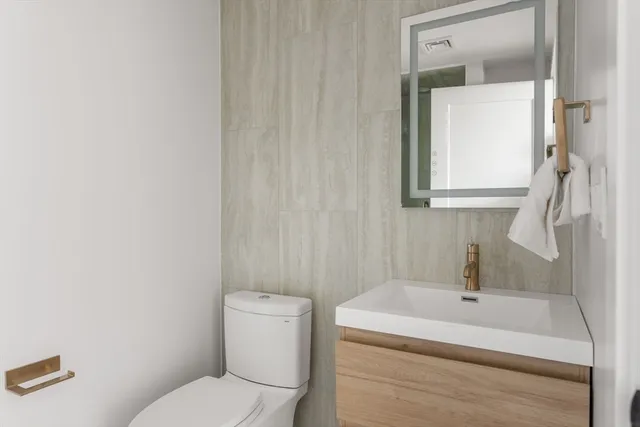 a bathroom with a sink and a toilet