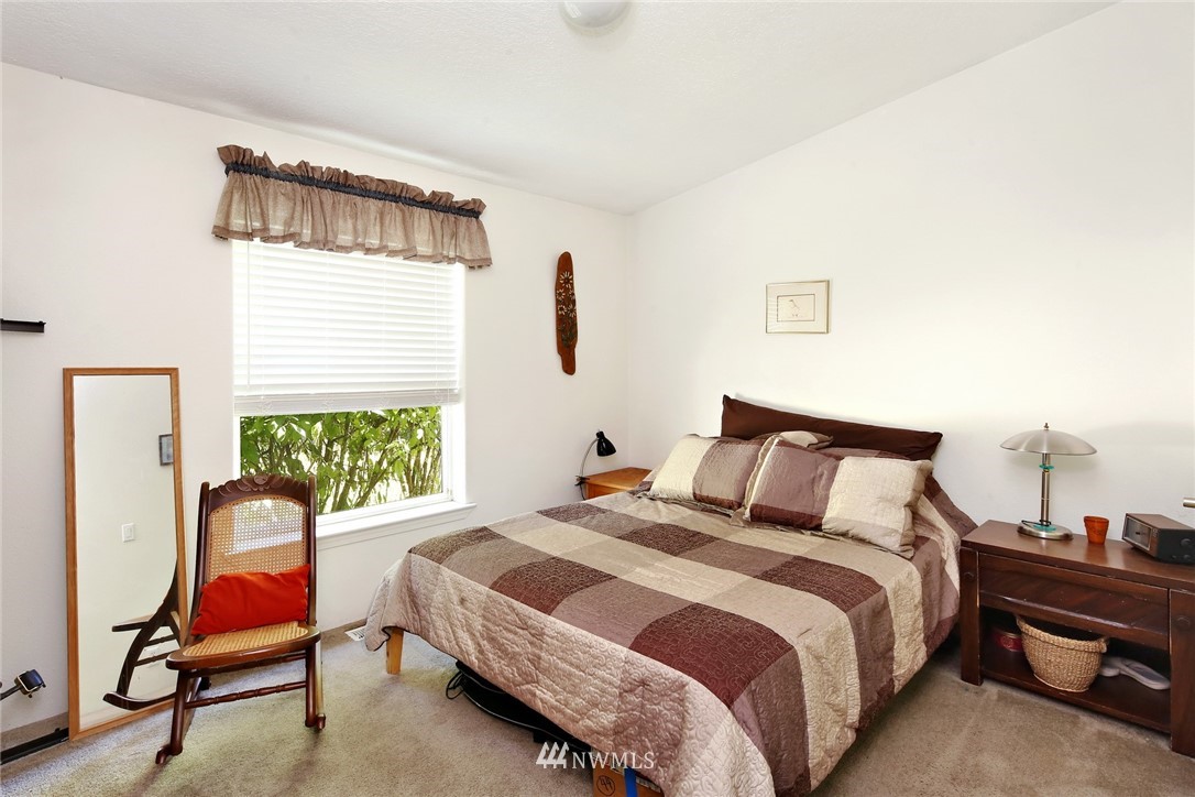 3125 Brown Road Ferndale, WA 98248 - Photo 14 of 24 a bedroom with a bed chair and window