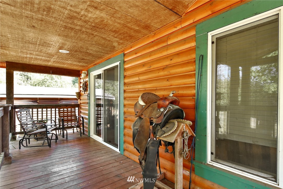 3125 Brown Road Ferndale, WA 98248 - Photo 17 of 24 a view of a room with wooden floor and door