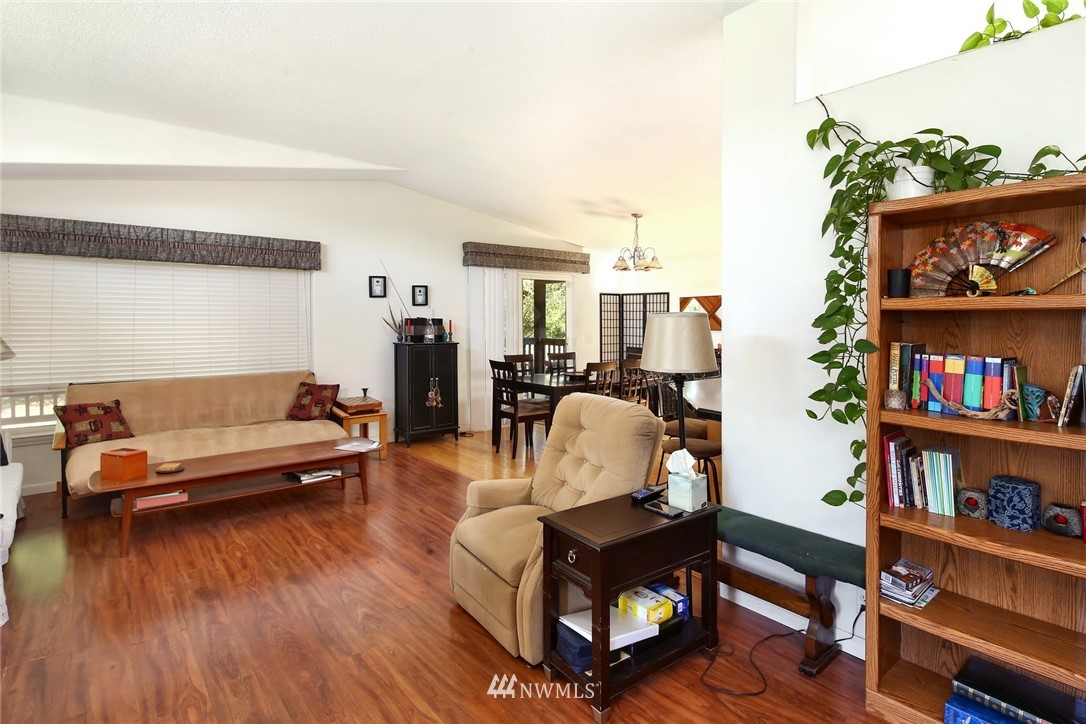 3125 Brown Road Ferndale, WA 98248 - Photo 3 of 24 a living room with furniture and a book shelf