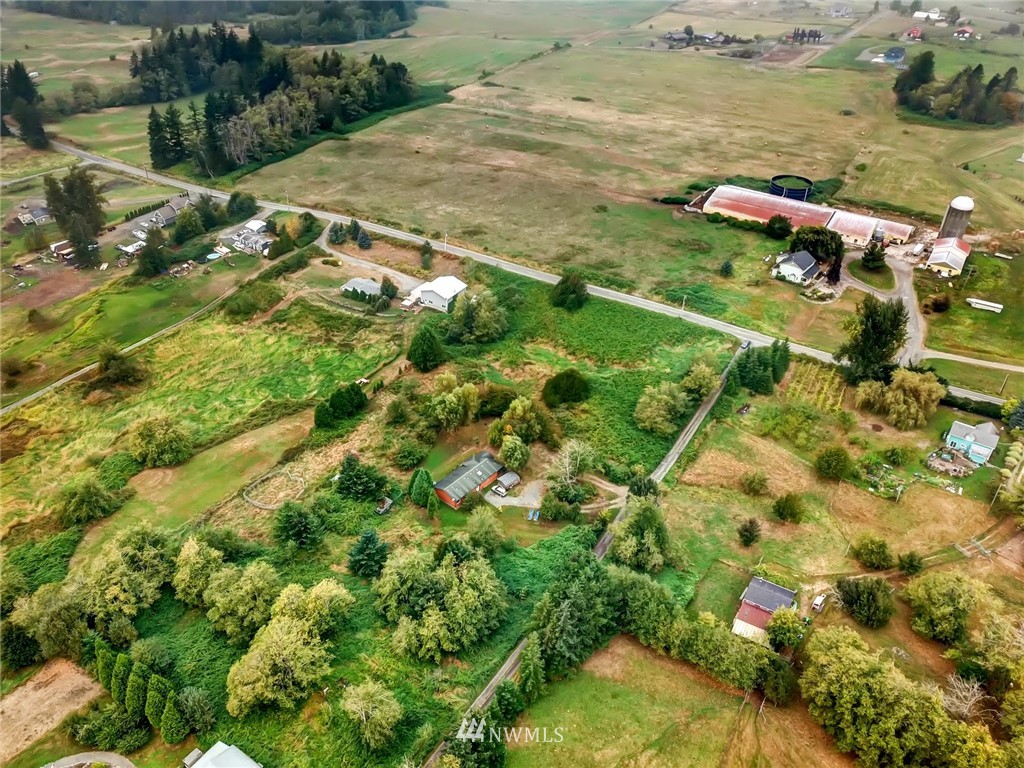 3125 Brown Road Ferndale, WA 98248 - Photo 21 of 24 a view of a yard with an ocean