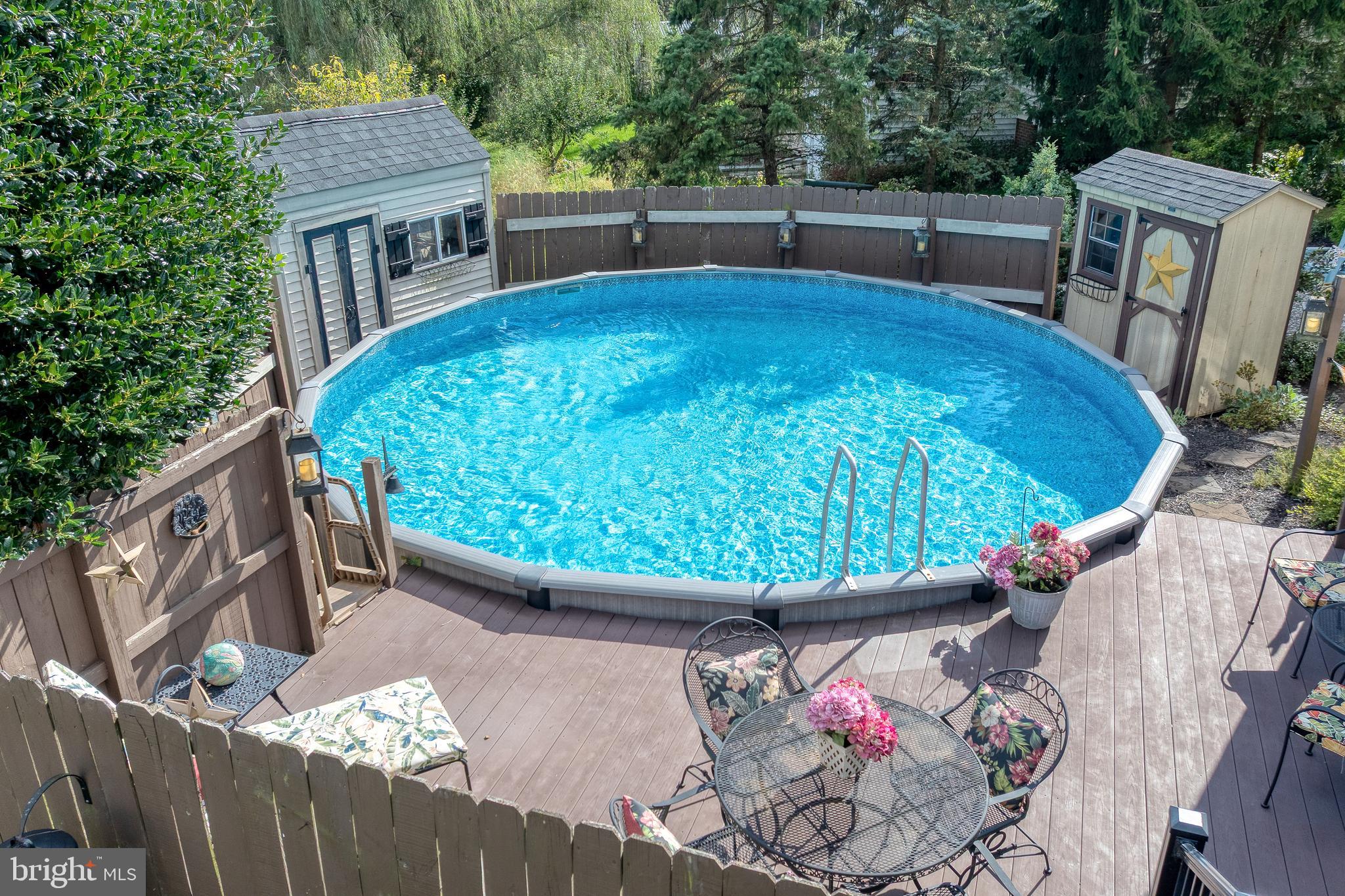 5 Village Drive Lititz, PA 17543 - Photo 44 of 62 a view of a backyard with a tub and wooden fence