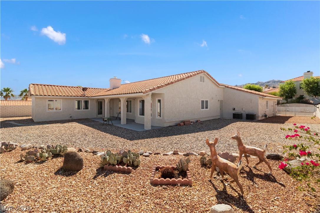 2055 Cholla Way Laughlin, NV 89029 - Photo 58 of 87 A terracotta-tiled roof crowns this desert oasis, surrounded by xeriscaping.