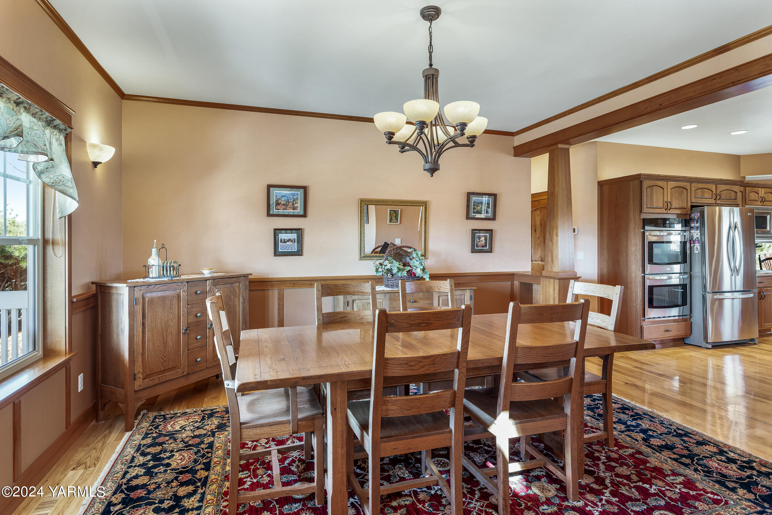 12401 Summitview Ext Road Yakima, WA 98908 - Photo 20 of 63 a view of a dining room with furniture and chandelier