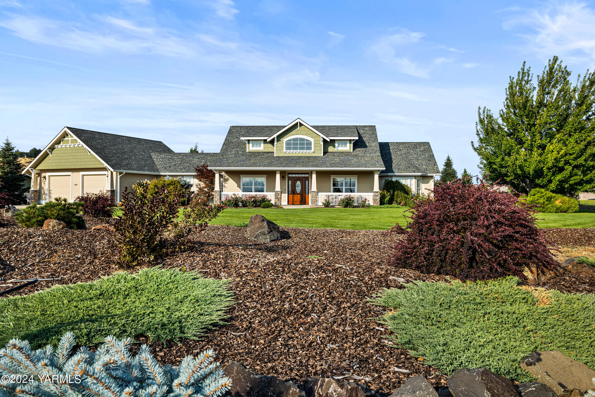 12401 Summitview Ext Road Yakima, WA 98908 - Photo 63 of 63 a front view of a house with a garden