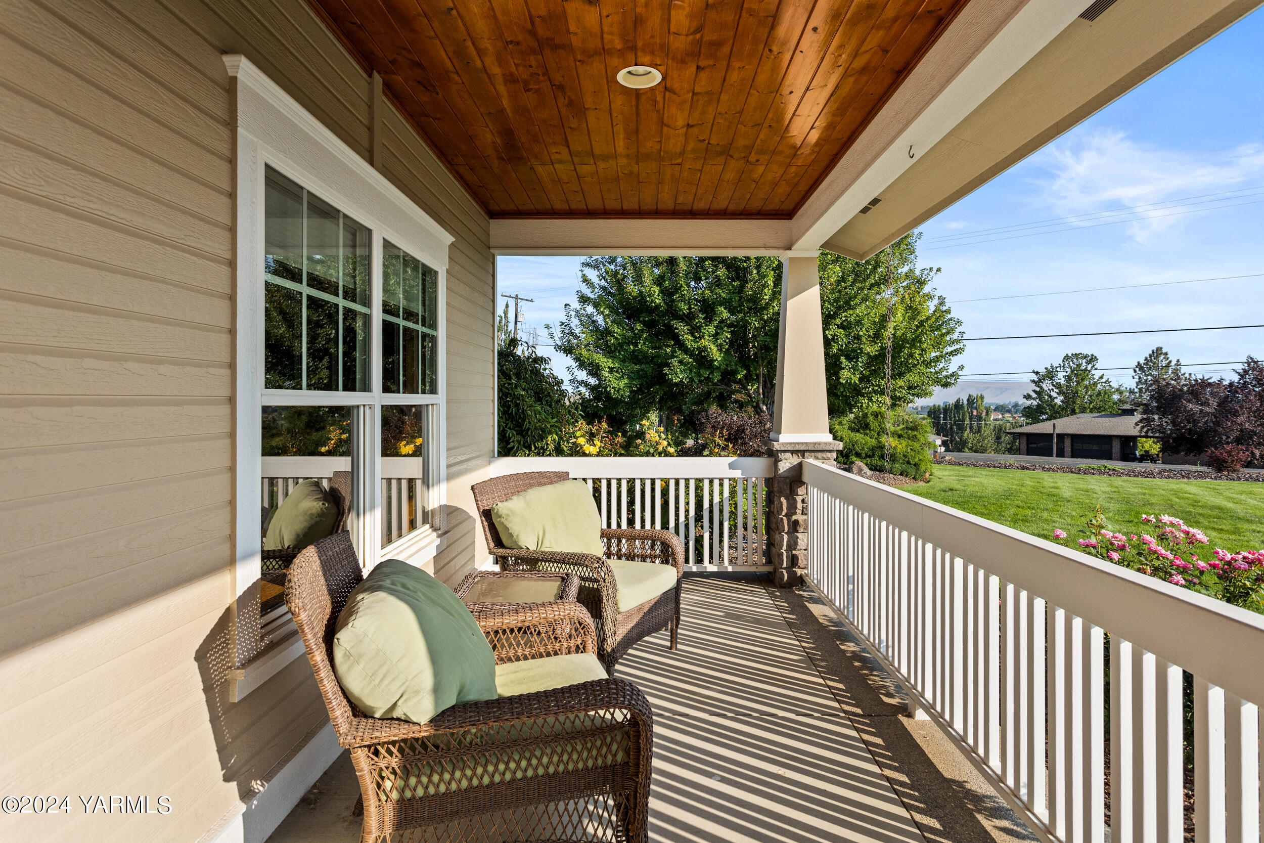 12401 Summitview Ext Road Yakima, WA 98908 - Photo 10 of 63 a view of balcony with wooden floor and outdoor seating