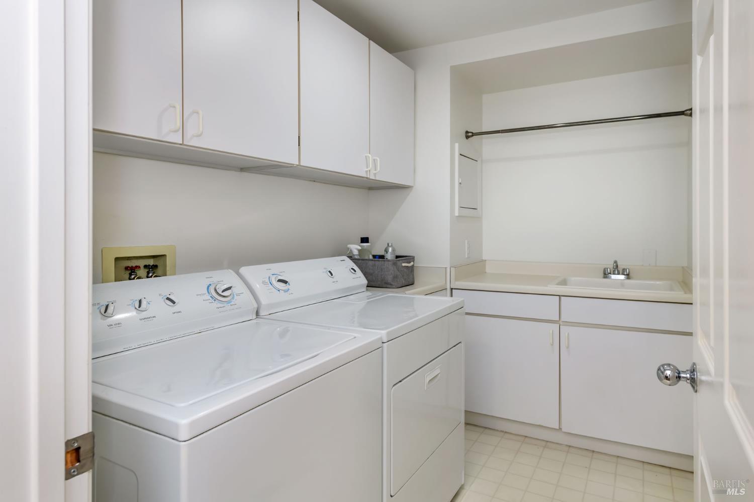 13 Laurel Glen Terrace San Rafael, CA 94903 - Photo 25 of 26 Large washer and dryer area with sink