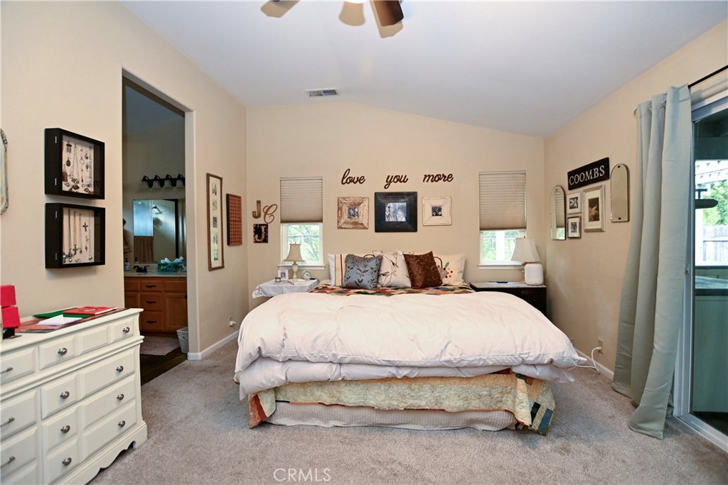 1422 Ridgebrook Way Chico, CA 95928 - Photo 13 of 25 a bedroom with a bed and dresser