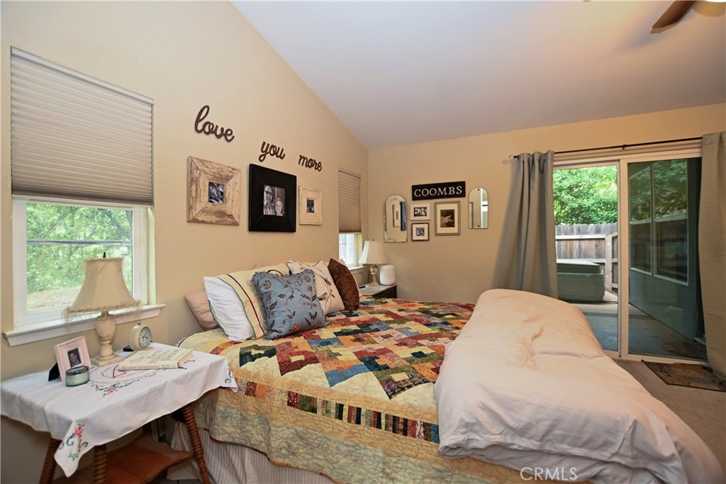 1422 Ridgebrook Way Chico, CA 95928 - Photo 14 of 25 a bedroom with a bed and wooden floor