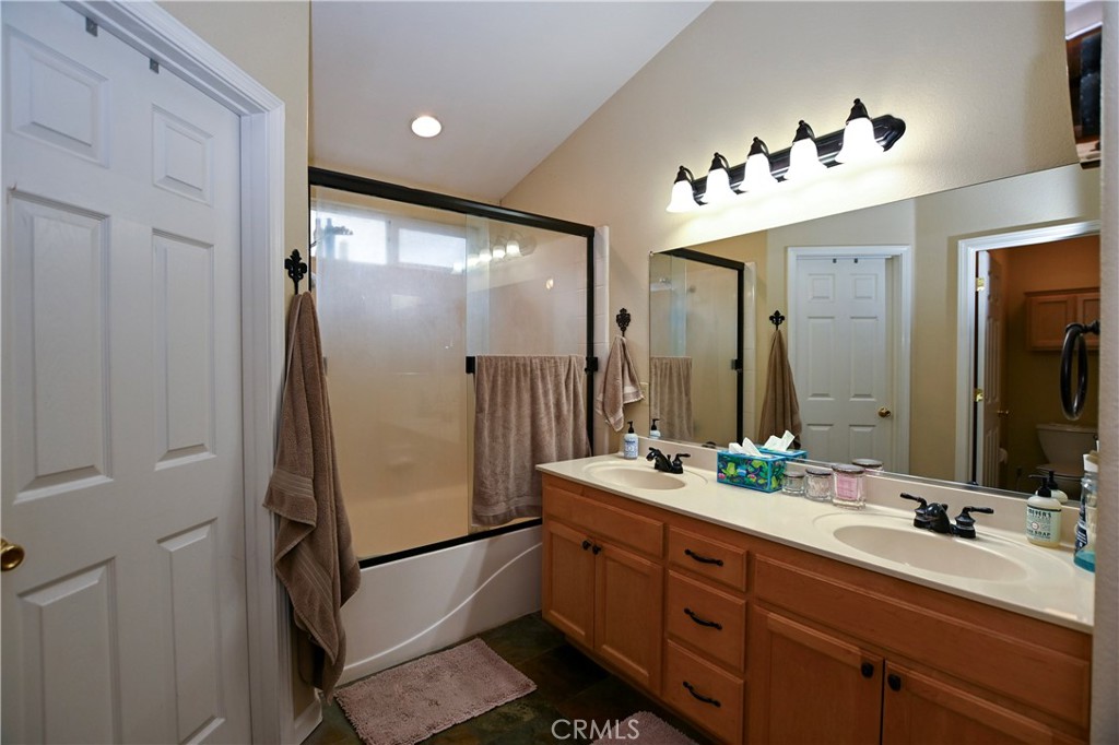 1422 Ridgebrook Way Chico, CA 95928 - Photo 15 of 25 a bathroom with a double vanity sink mirror and double