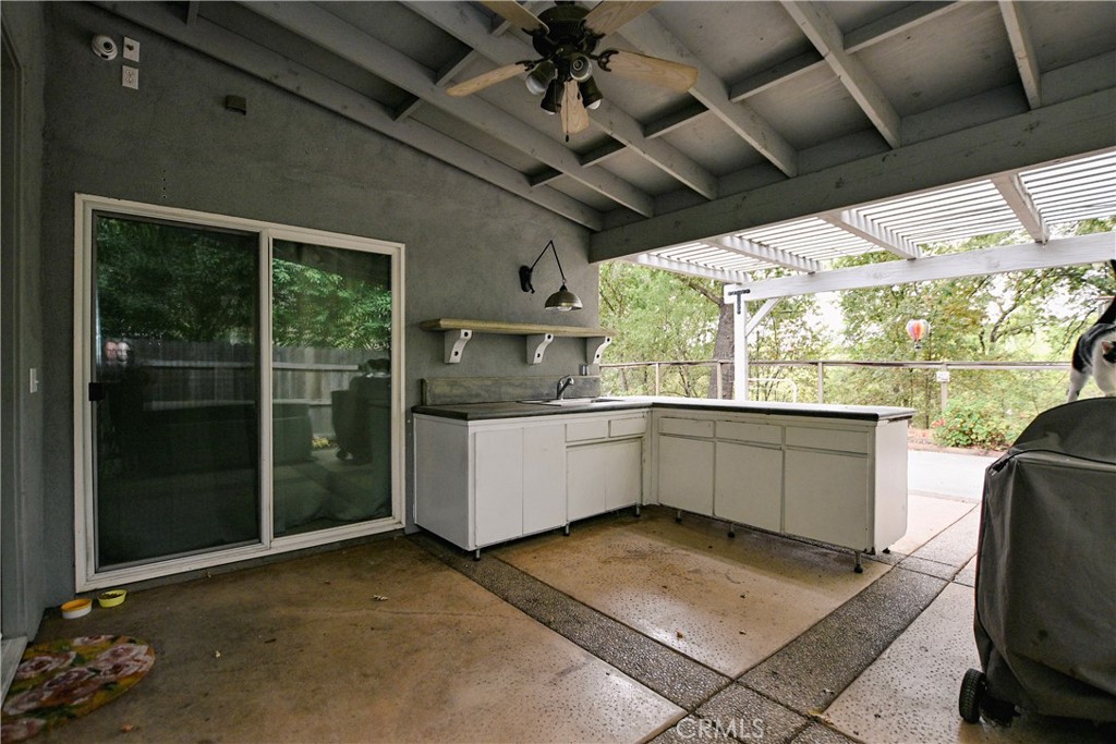 1422 Ridgebrook Way Chico, CA 95928 - Photo 21 of 25 a kitchen with windows and refrigerator