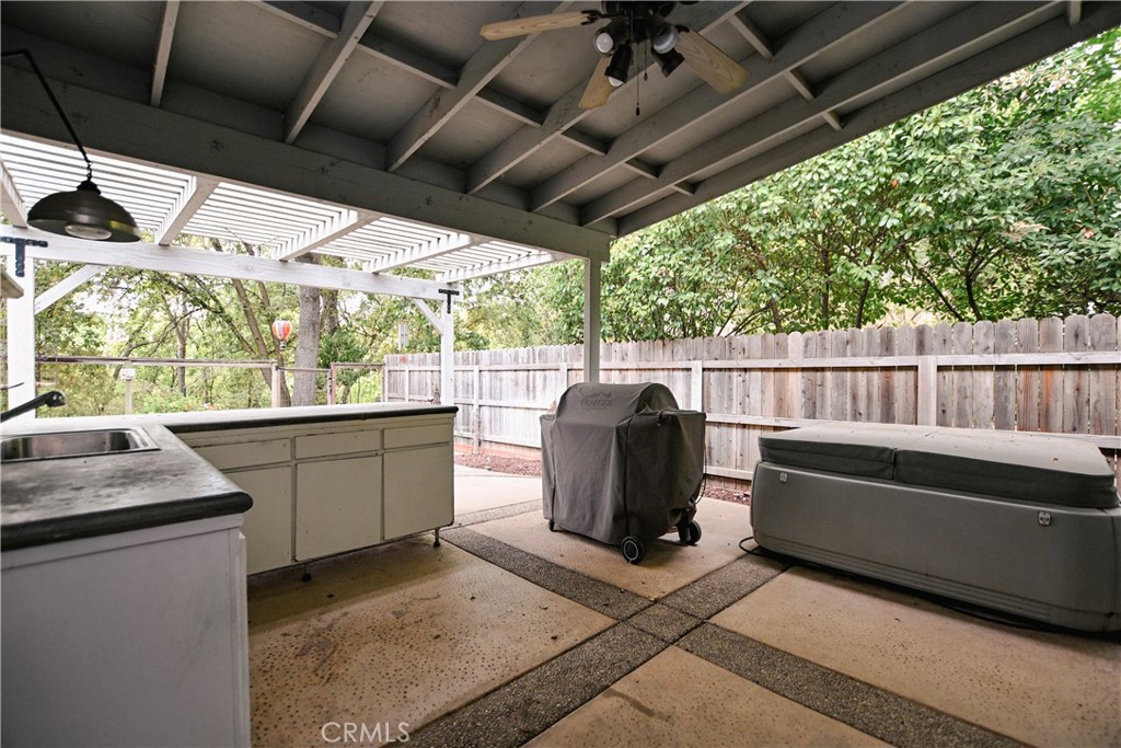 1422 Ridgebrook Way Chico, CA 95928 - Photo 22 of 25 a view of outdoor kitchen with a sink and dishwasher