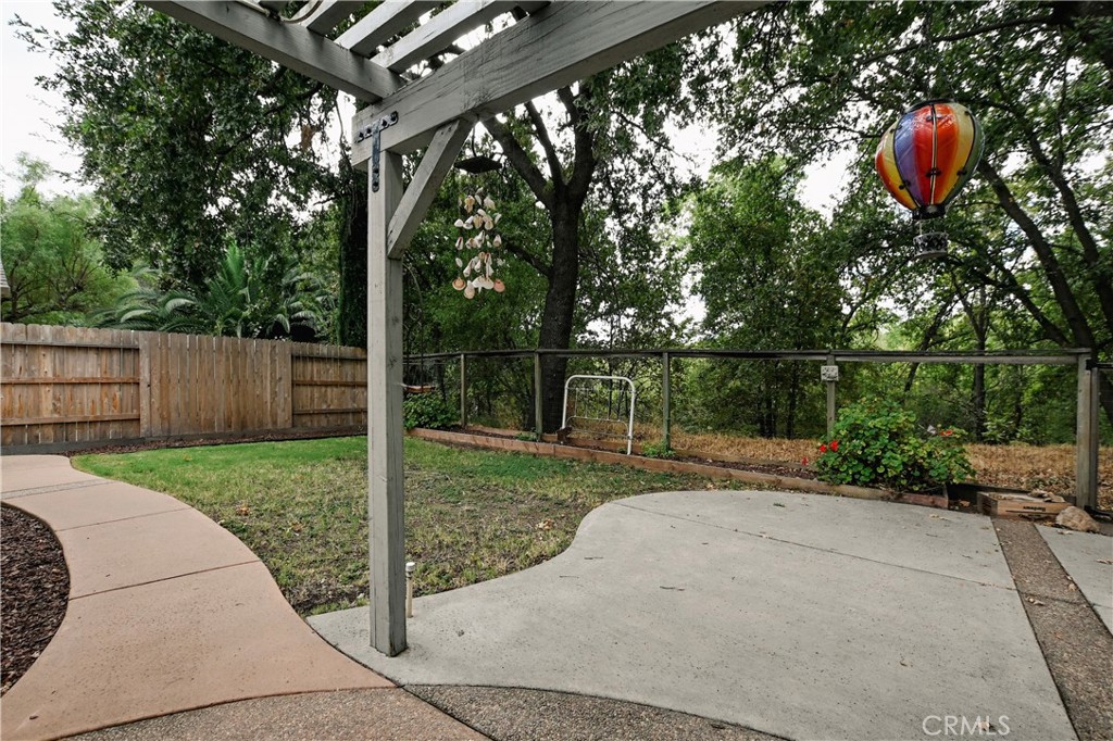 1422 Ridgebrook Way Chico, CA 95928 - Photo 24 of 25 a backyard of a house with lots of green space