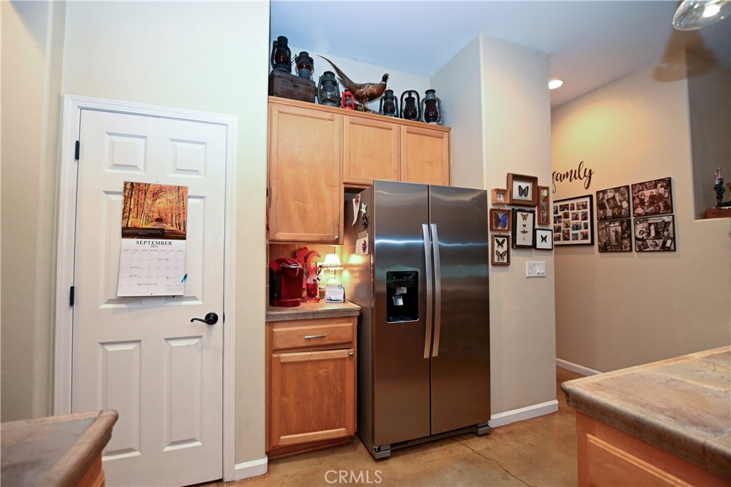 1422 Ridgebrook Way Chico, CA 95928 - Photo 6 of 25 a kitchen with stainless steel appliances a refrigerator and a stove